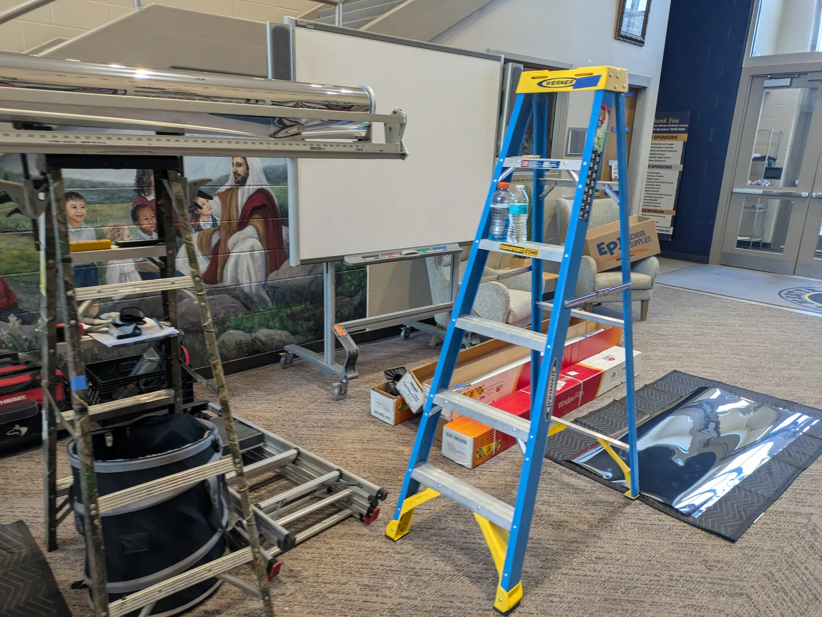 Security film install setup inside a parish school and church facility
