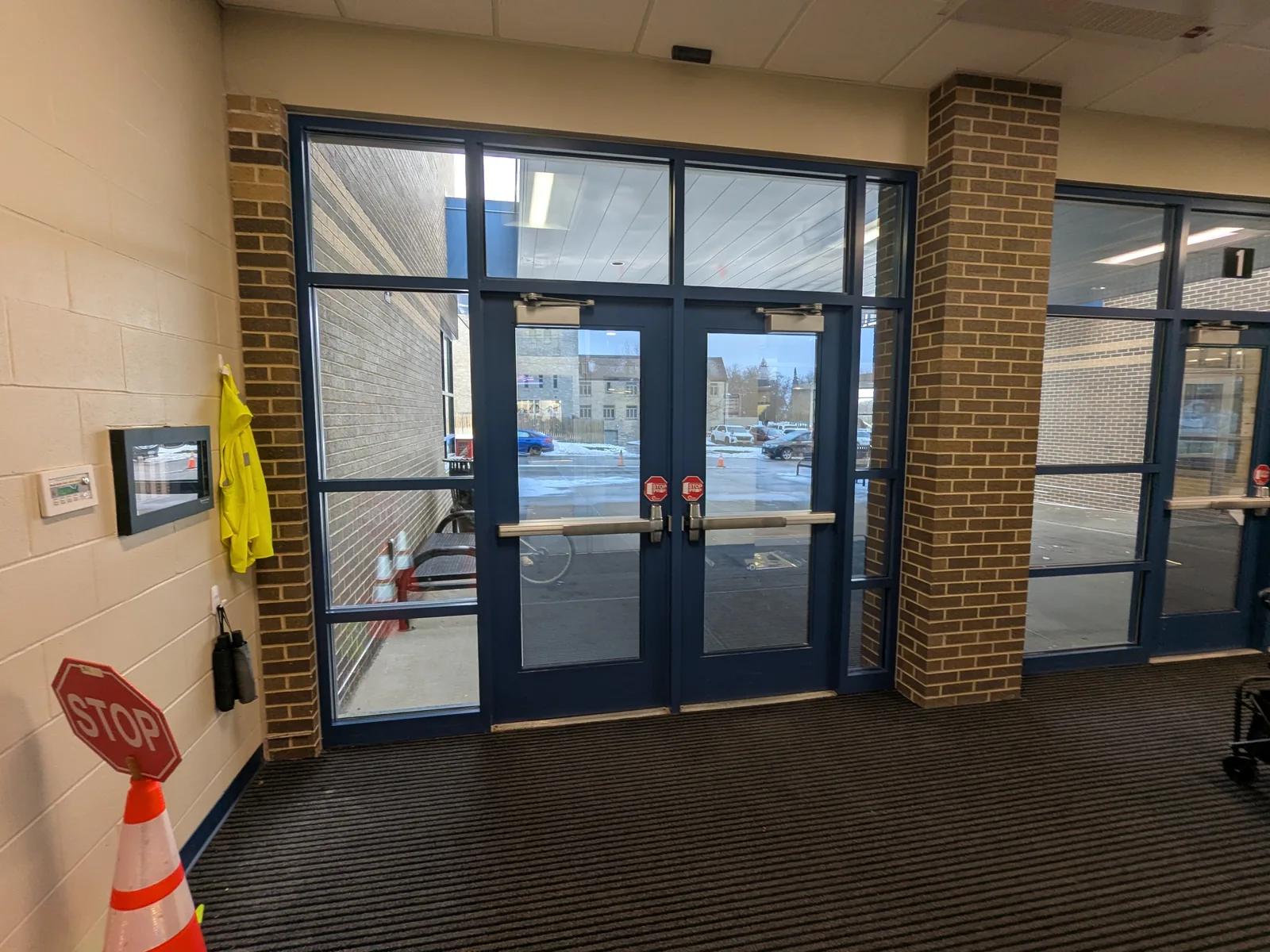 School double entry doors with safety and security film on the glass