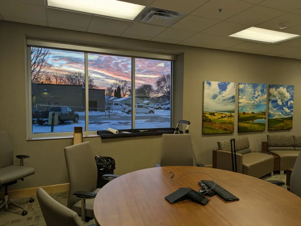Window film on large office windows at a company headquarters in Madison, SD