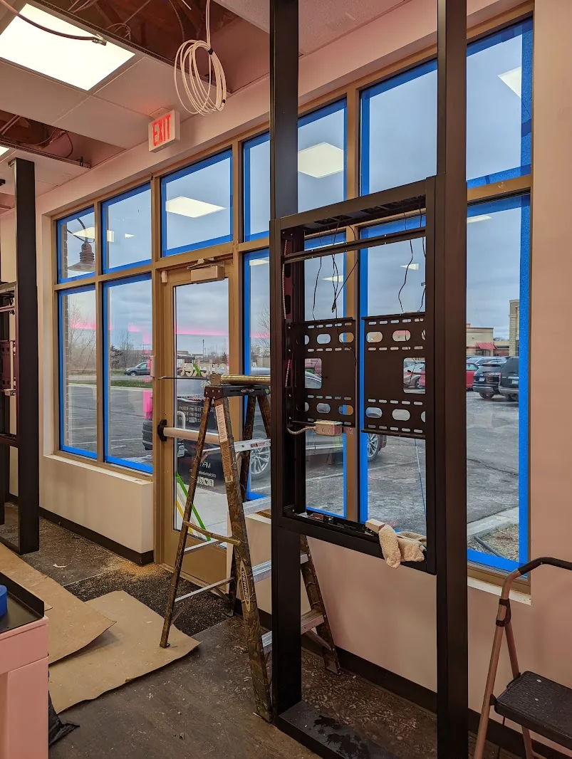 Glass door and frame during a security film installation